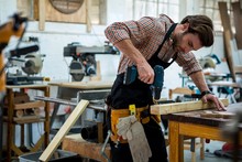 Carpenter Working On His Craft