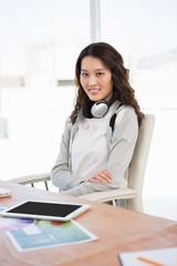 Poster - A businesswoman is in her office
