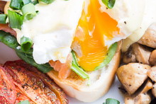 Eggs Benedict On Toasted Muffins With Fish, Musroom And Sauce