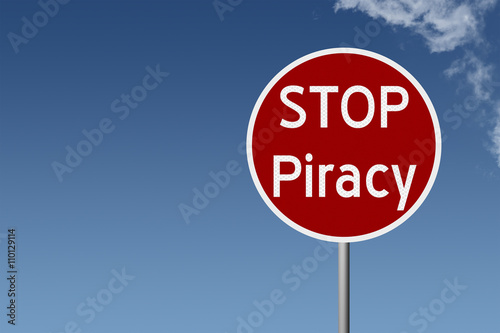 Fotografering Round highway road sign with text STOP piracy