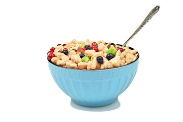 Poster - full bowl of muesli with berries and spoon on a white isolated background