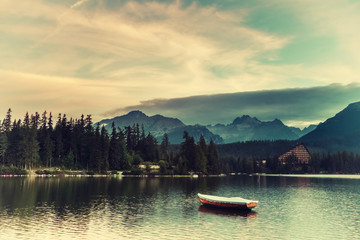 Wall Mural - vintage landscape with boats on a lake