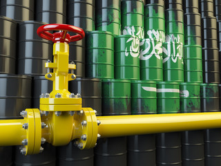 Oil pipe line valve in front of the Saudi Arabia flag on the oil