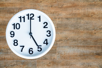 Wall Mural - Clock on wood background