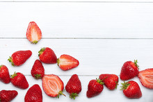 Strawberry Fruits On Wooden Background