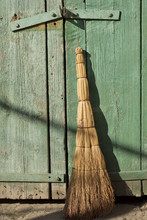 Old Broom Under The Old Wooden Gate