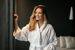 © NDABCREATIVITY - Beautiful glamorous woman in bathrobe