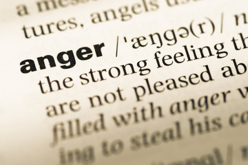 Wall Mural - close up of old english dictionary page with word anger