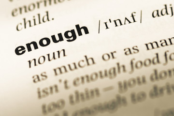 Wall Mural - close up of old english dictionary page with word enough
