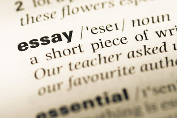 Wall Mural - close up of old english dictionary page with word essay