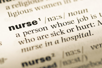 Wall Mural - close up of old english dictionary page with word nurse