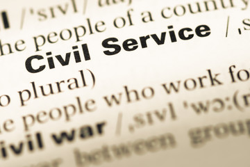 Wall Mural - close up of old english dictionary page with word civil service