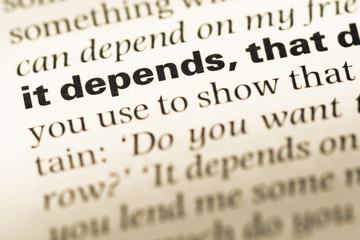 Wall Mural - close up of old english dictionary page with word it depends