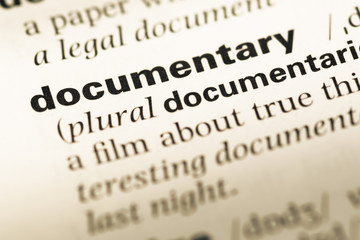 Wall Mural - close up of old english dictionary page with word documentary