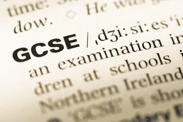 Wall Mural - close up of old english dictionary page with word gcse