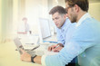 © goodluz - Businessmen in work meeting with laptop computer