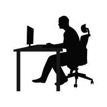 Man Sitting On Office Chair At Table And Working On Computer. Si