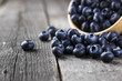 Blueberry on a dark wooden background