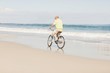 © WavebreakmediaMicro - Smiling senior man riding bike