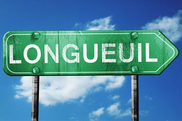 Wall Mural - Longueuil, 3D rendering, a vintage green direction sign