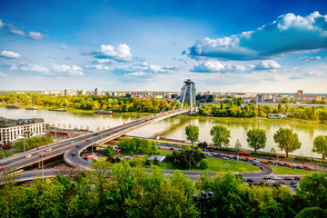 Bratislava cityscape view on the southern part of the city with modern bridge and Danube river from the castle hill. Bratislava is the capital of Slovakia