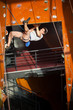 © anatoliy_gleb - Strong man with special equipment climbs on an indoor rock-climbing wall
