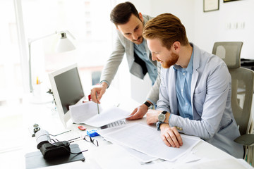 Coworkers planning startup goals