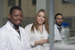© halid994 - Group of young medical workers are working in lab as lab technic