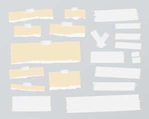 Poster - Pieces of ripped brown blank note paper, sticky, adhesive tapes are stuck on gray wall