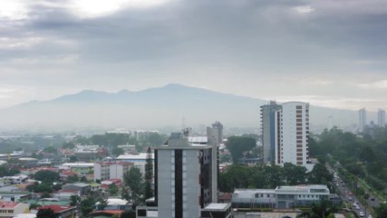 Wall Mural - Elevated view of traffic and mountain range against sky; Costa Rica