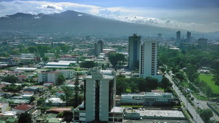 Wall Mural - Elevated view of city and mountain range against sky; Costa Rica
