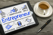 entrepreneur concept with business elements drawn on tablet pc
