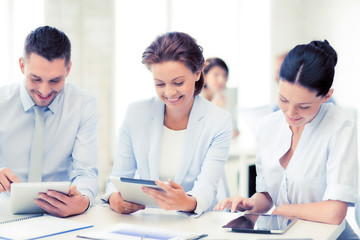 Poster - business team working with tablet pcs in office