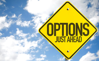 Options Just Ahead sign with sky background