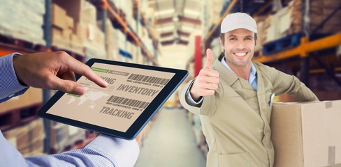 Poster - Composite image of man using tablet pc 