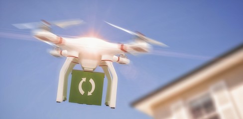 Poster - composite image of digital image of a drone holding a cube