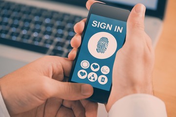 Poster - Composite image of businessman using smartphone