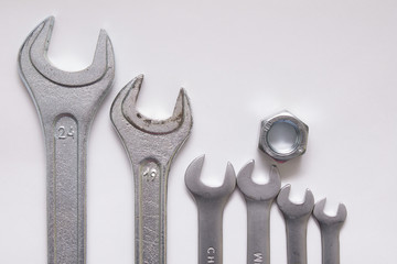 Wrench kit with nut on white background