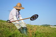 Old man mowing grass with mower / 草刈機で草刈りをする高齢者 農作業 農業 おじいさん おばあさん 農家 栽培