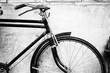 Black and white photo of vintage bicycle - film grain filter effect styles