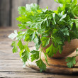 Fresh green parsley on the wooden table