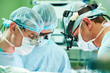 © Kadmy - male cardiac surgeon at child cardiosurgery operating room