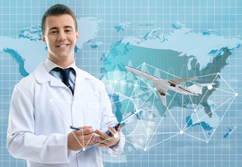 Wall Mural - Male doctor and virtual screen. Medical tourism concept