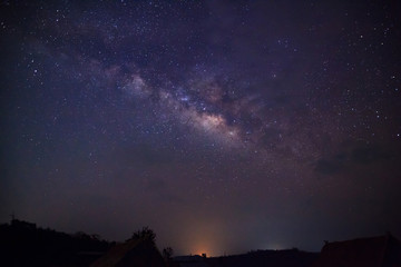 Wall Mural - silhouette of tree with cloud and milky way. long exposure photo