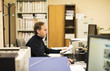 © FotoAndalucia - Side view of man working on computer at workplace