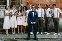 Groom In The Sunglasses And His Friends Behind