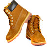 Brown lady's boots with shoelace on white background.