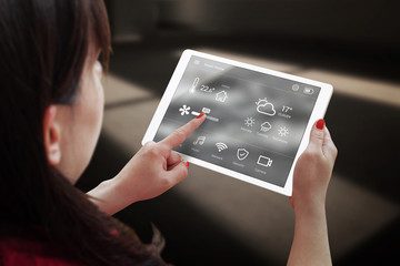 Poster - Smart home control on tablet. Interior of living room in the background.