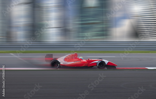 Zdjęcie XXL Wyścig samochodów wyścigowych z dużą prędkością w mieście