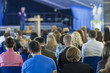 © danmorgan12 - Business Conference Concept and Ideas. Lecturer Speaking In front of the Group of People